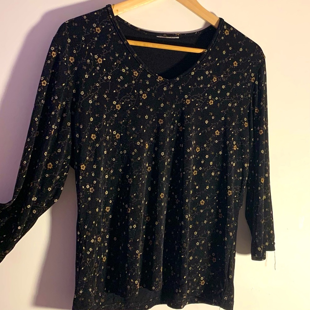 Beige flowered black shirt